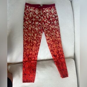 Vibrant Red Patterned Jeans with Intricate Design